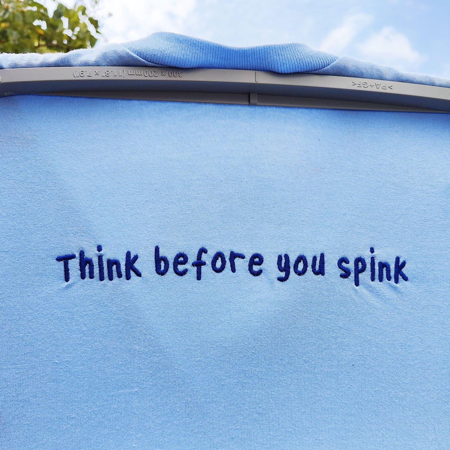 Think Before You Spink Embroidered Tee