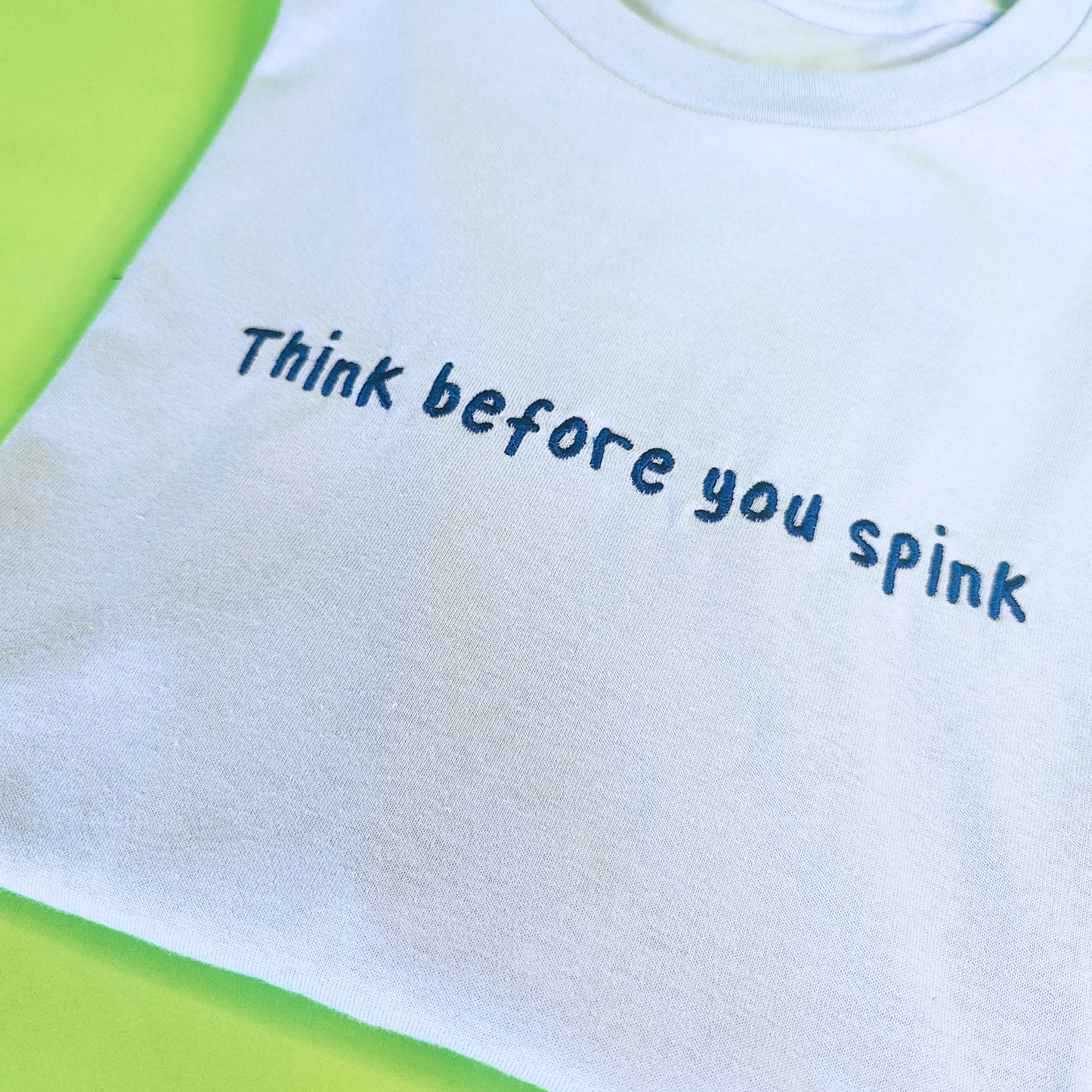 Think Before You Spink Embroidered Tee